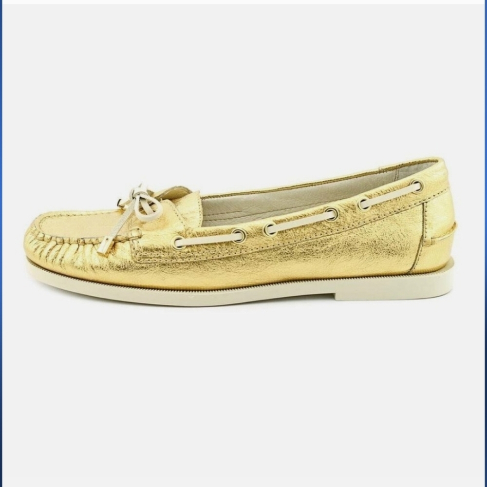 Michael Kors Blair Moc metallic gold leather loafers.